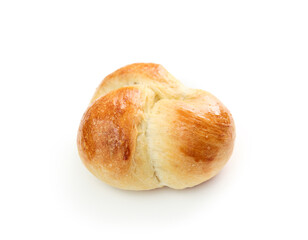 Isolated bread bun knot. Close up of baked yeast bread knot. Braided knot roll with egg wash. Traditional Swiss butter bread called Zopf or Challah prepared for holiday meals. Isolated on white.