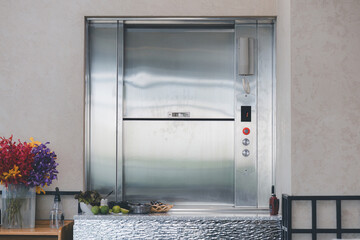 Dumbwaiter Lift elevator in a kitchen of Restaurant or Hotel used for carrying food or goods. Food...