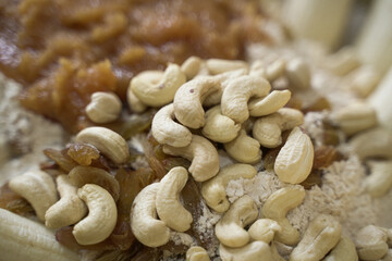 close up of cashew nuts. Cashews and raisins are dry fruits.