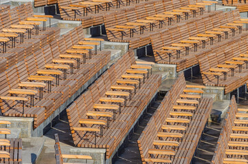 Wooden benches in the open-air amphitheater