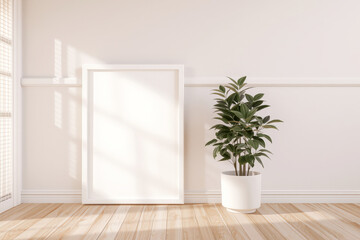 blank frame stands against light wall, accompanied by green plant in white pot, creating serene and minimalistic atmosphere in room