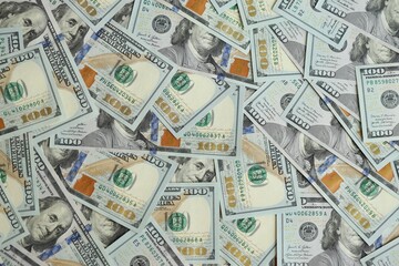 Big amount of american USD hunderd dollar bills banknotes close up