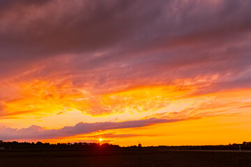 Sunset with dramatic clouds near Forstern, Moos, Isar, Deggendorf, Bavaria, Germany