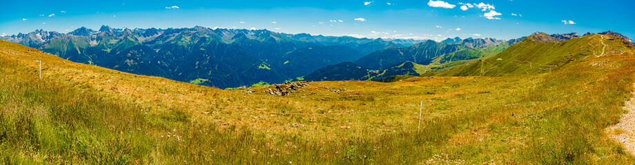 High resolution stitched alpine summer panorama at Mount Schoenjoch, Fiss, Inntal valley, Samnaun, Landeck, Tyrol, Austria