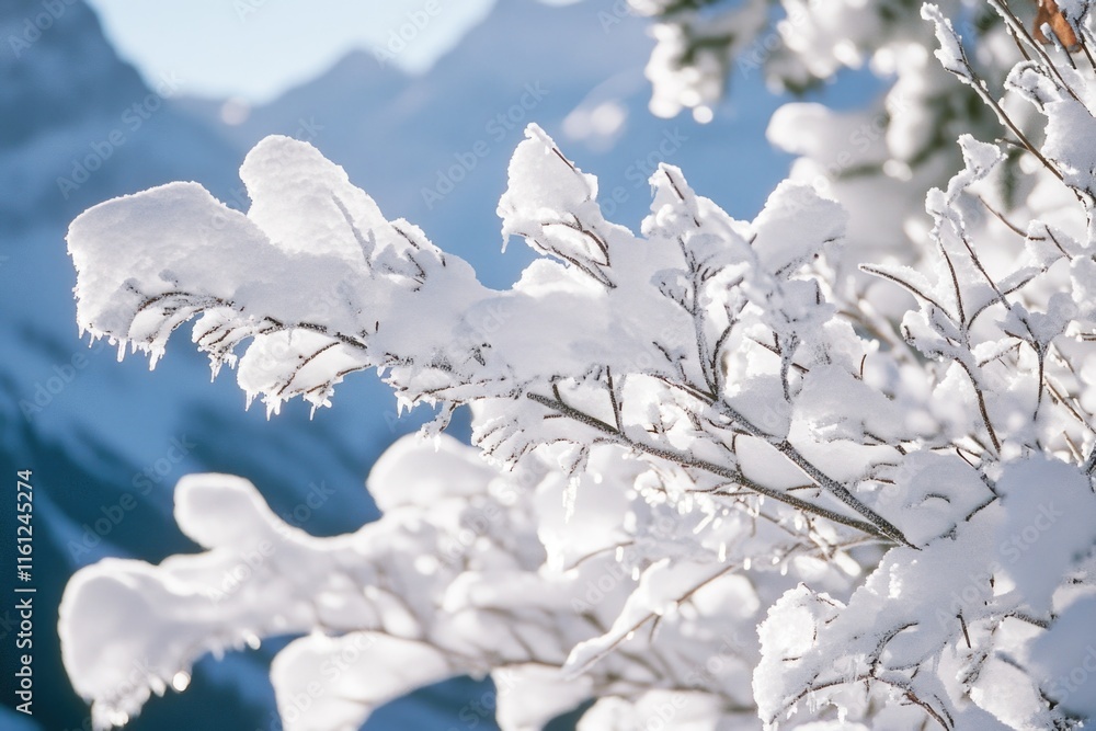 Poster a single tree covered in snow with a mountain landscape in the background