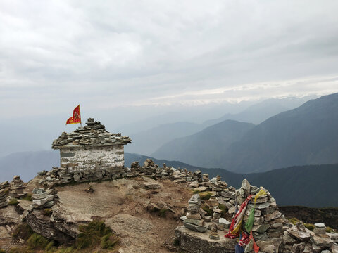 Chandrashila Peak with Prayer flags near Tunganath lord Shiva temple, Chopta - Uttarakhand, India