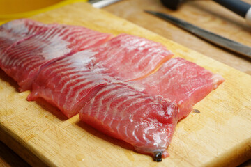 Preparing sliced carp fish