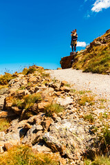 Alpine summer view with an egypt-style statue at Mount Schoenjoch, Fiss, Inntal valley, Samnaun, Landeck, Tyrol, Austria