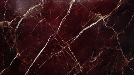 Luxurious burgundy marble with white and gold veining texture