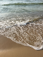 Wave of sea with foam. Natural background.