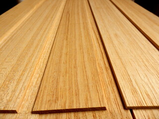 Wooden tiles slatted together to be used as ceiling or wall tiles
