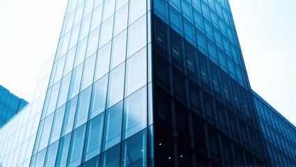 Obraz premium A modern glass skyscraper facade reflecting the sky, showcasing sleek architectural design, symmetry, and contemporary urban aesthetics. Generative, AI,