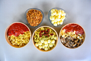 Delicious meat kebab with fresh vegetable salad served with variety of Turkish dishes and appetizers. Top view of assorted Turkish food and meze, tasty and healthy Mediterranean cuisine.