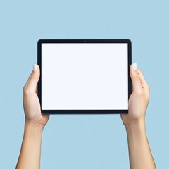 Tablet with blank screen on blue.