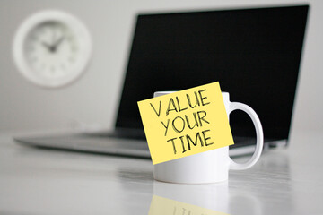 Value Your Time is shown using the text on cup