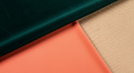Fototapeta premium Luxurious Fabric Swatches: Emerald Velvet, Coral, and Beige Textures