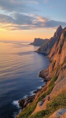 Fototapeta premium Stunning coastline view at sunset, showcasing rugged cliffs and calm sea. The warm colors of sunset reflect off the water, creating a serene atmosphere in nature.