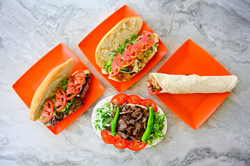 Turkish  Traditional Ramadan doner kebab with tasty tomato sauce and rice or turkish pilav in white...