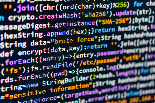 Brute force. Close-up of coded screen shallow depth of field, focusing on C code, array manipulation, loop, and console print in the code