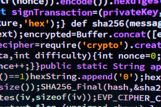 Image depicts a C coding environment within an Integrated Development Environment IDE, with redacted code, comments, variable declarations, and method calls