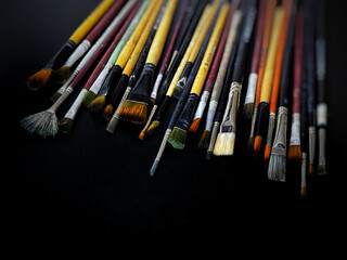 Fototapeta premium Artist brushes on black
