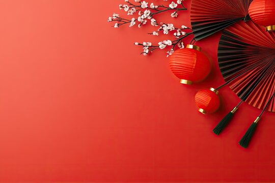 Festive still  life 2026 lunar new year concept  with traditional red lanterns, paper fans, cherry blossoms on red background. Flat lay, top view, copy space 