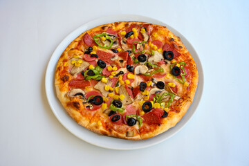 Traditional Turkish cuisine. Pizza, pita, pidesi, sucuk, hummus, kebab. Many dishes on the table. Serving dishes in restaurant. Margherita,  mix, formaggi, veggie karisik pizza. Top view, flat lay