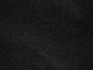 Black fabric texture background showing clothing material