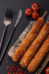 Lula kebab meat fried on a fire in breading with salt, spices and herbs