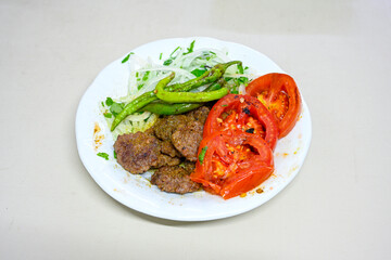 Meatball between bread (Turkish name : ekmek arasi kofte ) Izgara kofte. Manisa, Akcaabat, Akhisar  kofte. Delicious meat grilled meatballs.