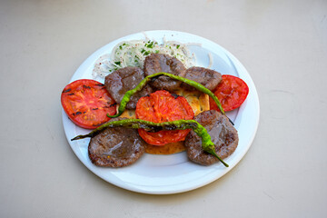 Meatball between bread (Turkish name : ekmek arasi kofte ) Izgara kofte. Manisa, Akcaabat, Akhisar  kofte. Delicious meat grilled meatballs.