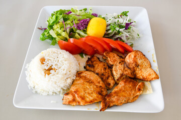 Chicken wings barbeque in a dish with BBQ grill sauce . Izgara tavuk kelebek sis kanat. Tavuk sis, gogus.