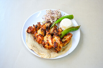 Chicken wings barbeque in a dish with BBQ grill sauce . Izgara tavuk kelebek sis kanat. Tavuk sis, gogus.
