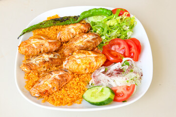 Chicken wings barbeque in a dish with BBQ grill sauce . Izgara tavuk kelebek sis kanat. Tavuk sis, gogus.