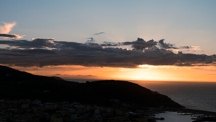 Dramatic sky over the sea at sunset. Sardinia, Italy