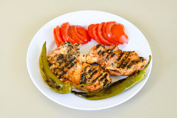 Chicken wings barbeque in a dish with BBQ grill sauce . Izgara tavuk kelebek sis kanat. Tavuk sis, gogus.