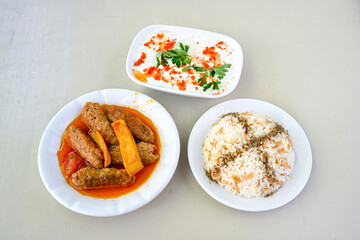 Very nice izVery nice izmir patties, potatoes, tomatoes and Turkish spices. Izmir Kofte. Sulu Kofte.mir patties, potatoes, tomatoes and Turkish spices. Izmir Kofte. Sulu Kofte.