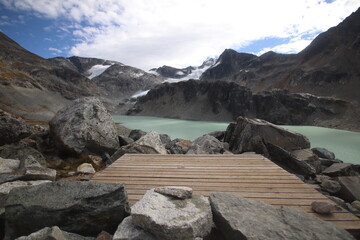 camping site platform POV on glacier lake