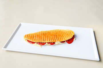 Turkish karisik atom kare  tost ( kasarli bazlama tost) . Sucuklu, Kasarli,  cheddarli, kavurmali karisik tost. Flat baked bread toasted. Karisik bazlama tost .