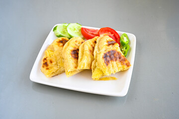 Turkish karisik atom kare  tost ( kasarli bazlama tost) . Sucuklu, Kasarli,  cheddarli, kavurmali karisik tost. Flat baked bread toasted. Karisik bazlama tost .
