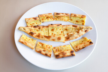 Kiymali pide. Turkish pide with minced meat. Turkish pizza mince pita Pide on white background. Etli ekmek. Kusbasi kasarli, kiymali kasarli, kiymali yumurtali, Bafra, Trabzon, Kusbasili pide.