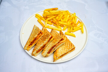 Turkish karisik atom kare  tost ( kasarli bazlama tost) . Sucuklu, Kasarli,  cheddarli, kavurmali karisik tost. Flat baked bread toasted. Karisik bazlama tost .