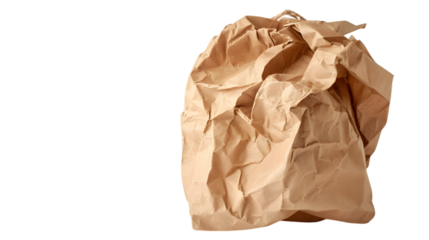 A crumpled brown paper bag with visible texture, isolated on a bright white surface 