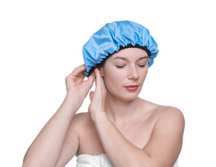 Woman wearing blue shower cap on white background