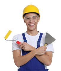Portrait of young decorator with paint roller and putty knife on white background