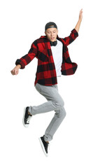 Handsome young skater jumping on white background