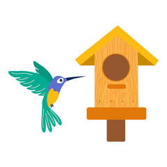 Hummingbird visits wooden birdhouse in a colorful garden setting on a sunny day