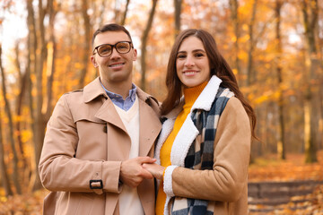 Fototapeta premium Happy couple spending time together in autumn park