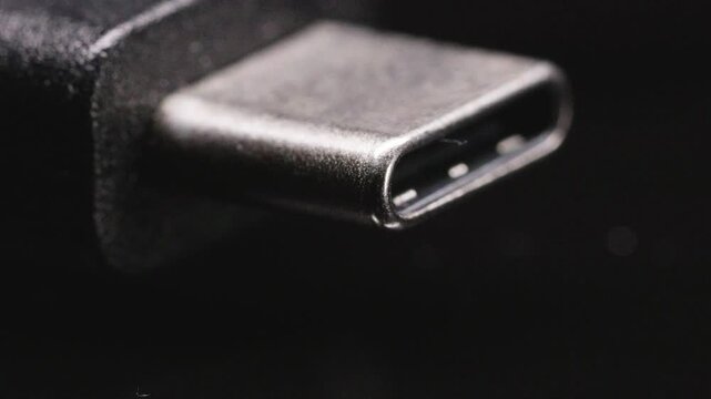 Close-up of computer connection cables in varying light conditions type a usb and type c