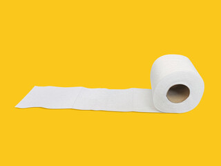 Toilet paper roll on yellow background